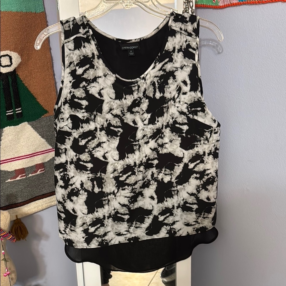 Cynthia Rowley Black and White Sleeveless Top. Back bottom half is sheer!!